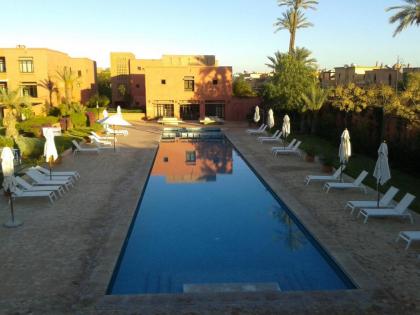 Apartment with 2 bedrooms in Marrakech with shared pool furnished terrace and WiFi 185 km from the beach - image 15